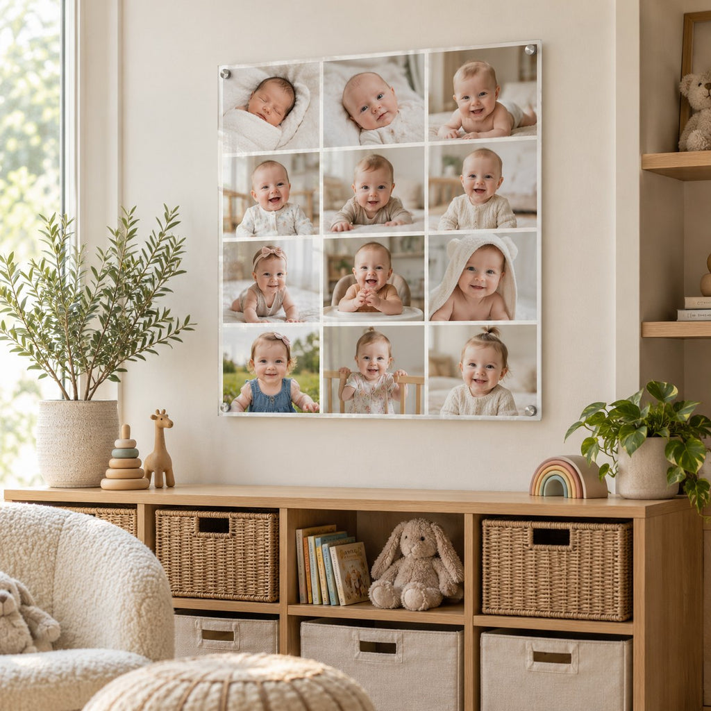Twelve monthly baby photos arranged in a grid on one large acrylic collage print, hung in a playroom above a cube shelf