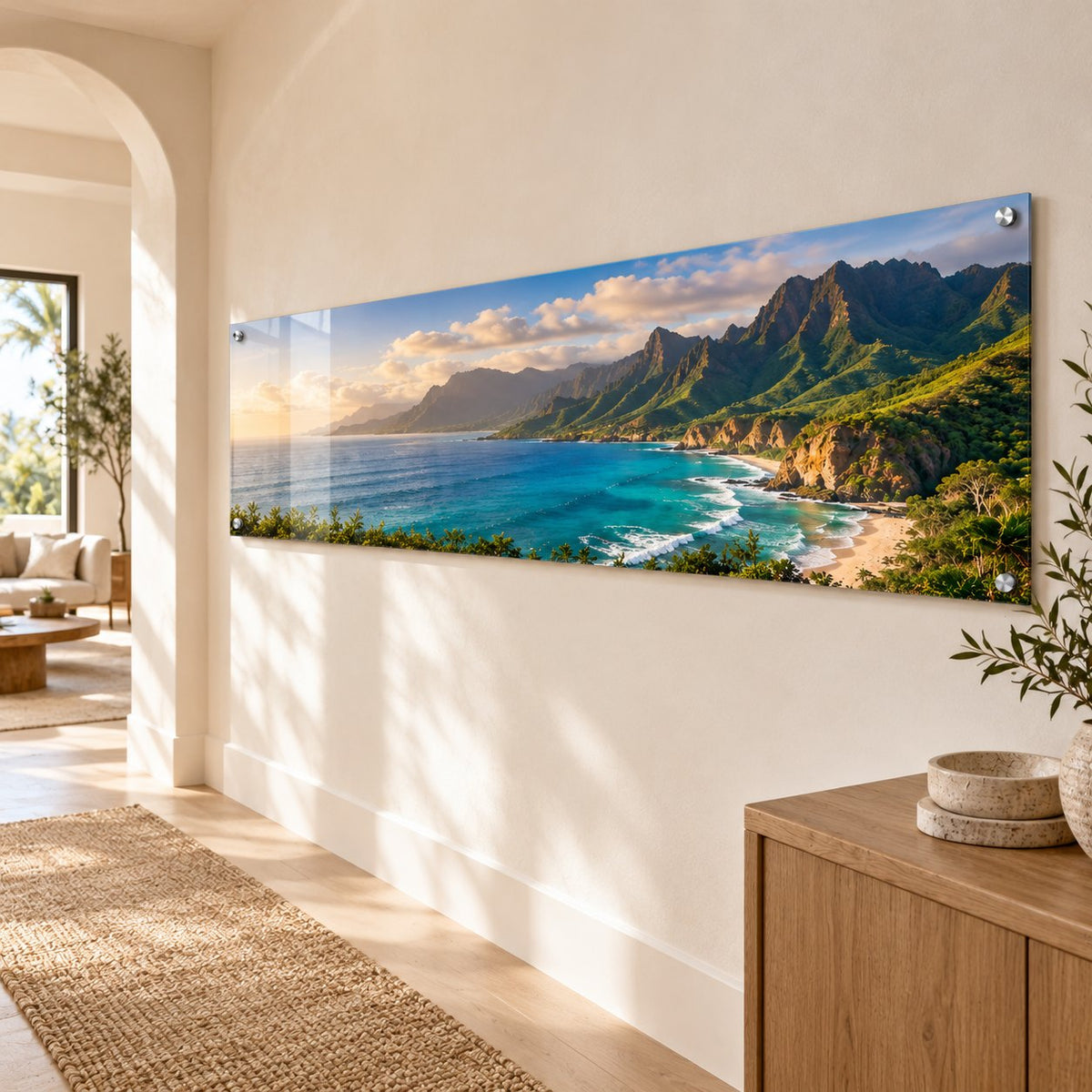 Panoramic coastline travel photo on a long clear acrylic print hung in a hallway