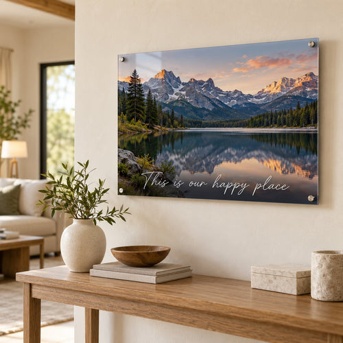 Mountain lake photo with the script text This is our happy place, printed on clear acrylic above a console table