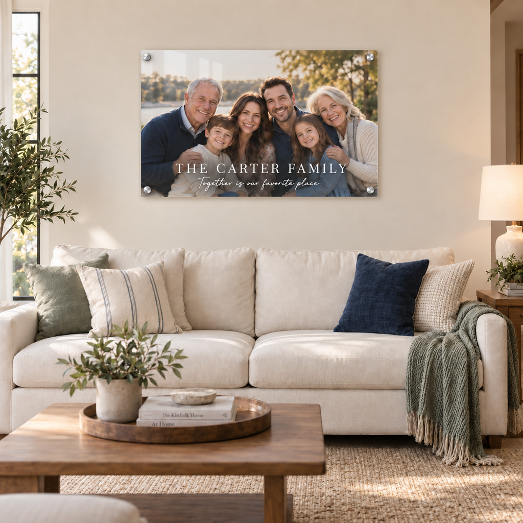 42 × 28 inch personalized family portrait acrylic print hung above a sofa in a living room