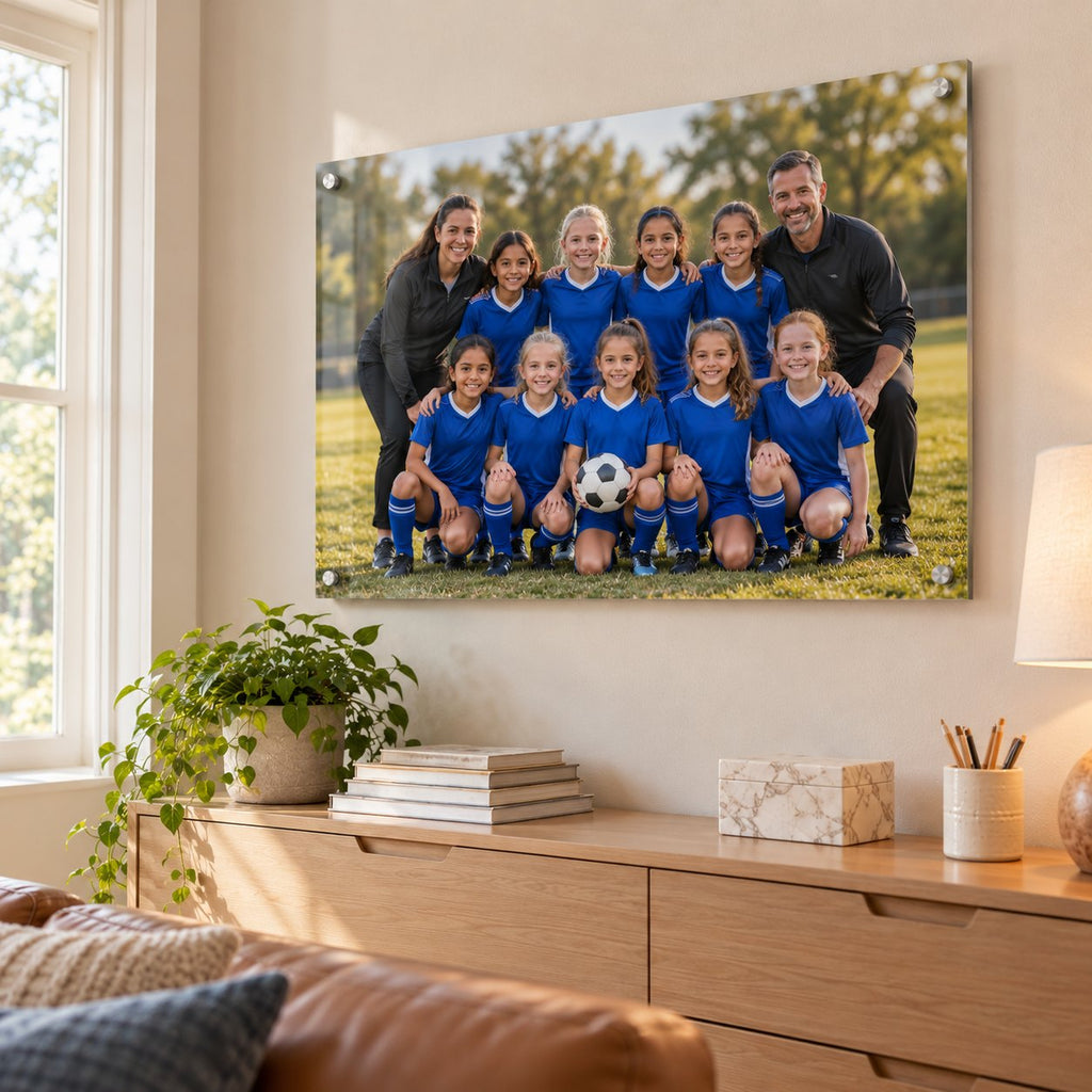 Youth soccer team photo with coaches printed on clear acrylic and hung above a sideboard