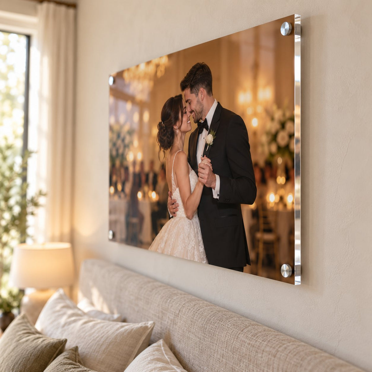 Angled view of a wedding first dance acrylic print showing the glossy finish and brushed silver standoffs